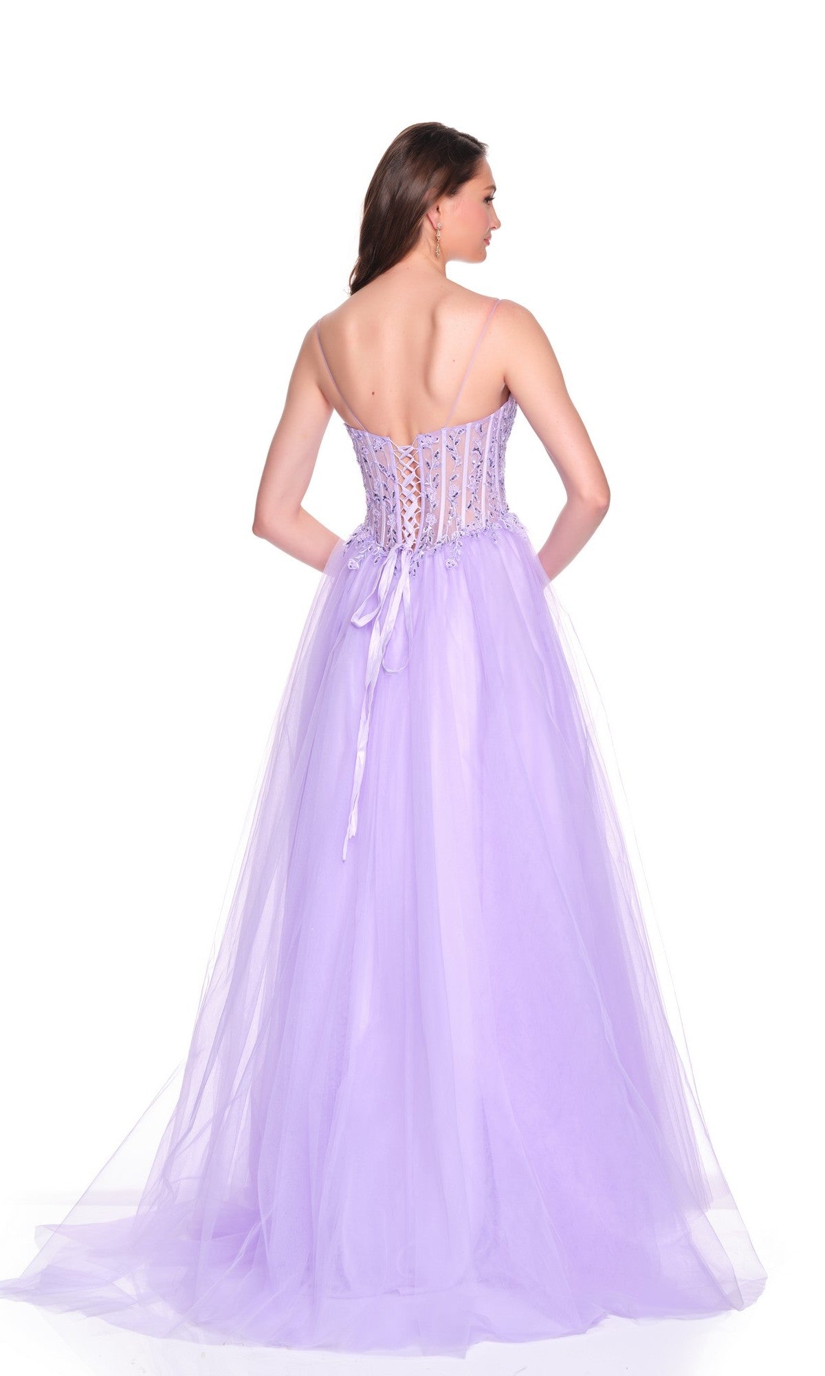A woman stands facing away, wearing the Dave and Johnny 12581 long strapless prom dress with an embellished bodice and full tulle A-line skirt against a white background.